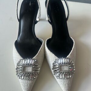 Cute black, white and silver heels. Worn one time